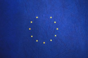 Brexit FAQs. Small stars form a circle on a dark blue background